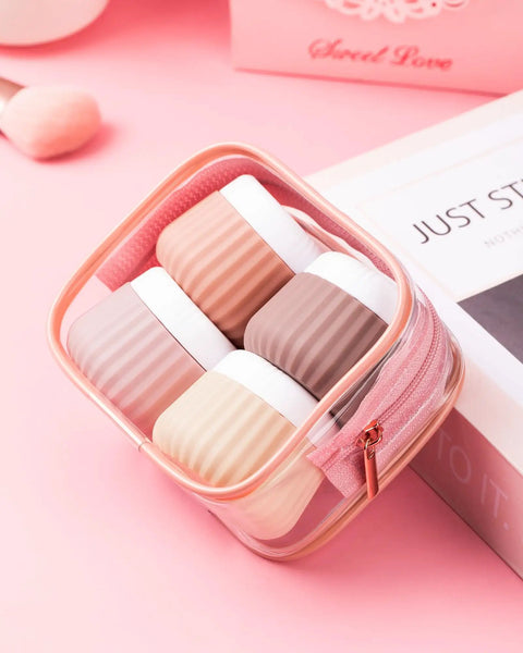 TSA Approved Travel Containers Four Pack With Leak Proof Silicone Jars And Rose Gold Transparent Cosmetic Bag For Toiletries