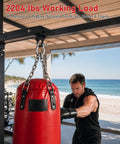 Rock Solid 3/8 Inch 304 Stainless Steel D Ring Tow Shackles Hella Rust Resistant Marine Clevis Hook Heavy Duty Boat Towing Rigging Engine Block Lifting Kit Top Shelf Hardware For Weekend Warriors And Daily Jobs on a gym setup with a punching bag.