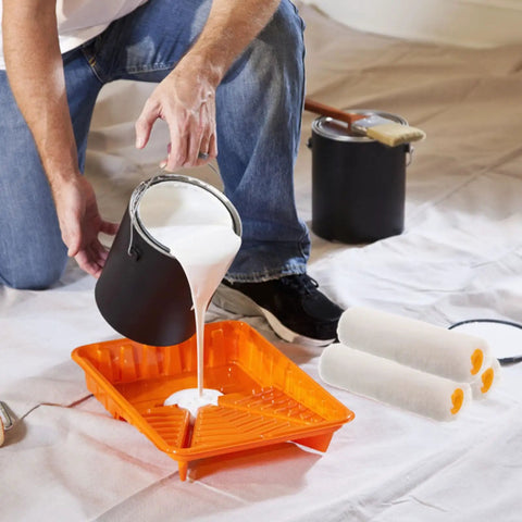 Small Paint Roller Covers 10 Pack, Reusable Cotton Fiber Sleeves, Smooth Operator Design For Wall And Ceiling Jobs, Quick Swap Feature For No Sweat Painting And Slick Finish pouring paint into tray.