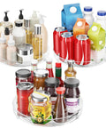 Four Pack Slick 9.5 Inch Lazy Susan Turntable Organizer with assorted liquids, snacks, and toiletries for storage.