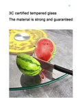 Glass Lazy Susan Turntable with Silent Aluminum Bearing and half-cut watermelon on top, highlighting serving use.