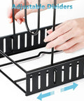 Hands adjusting rubberized dividers on Heavy Duty Adjustable Pots And Pans Organizer Under Cabinet With Anti Slip Rubber Dividers Tight Fit Home Kitchen Storage Rack Premium Big Time Organization.