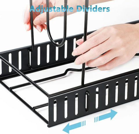 Hands adjusting rubberized dividers on Heavy Duty Adjustable Pots And Pans Organizer Under Cabinet With Anti Slip Rubber Dividers Tight Fit Home Kitchen Storage Rack Premium Big Time Organization.