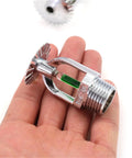 Top Shelf Five Pack Pendent Fire Sprinkler Heads With 1/2 Inch Thread 199 Degree Fahrenheit Rated Green Glass Bulbs And Boss Level Nickel Finish Including Dead Simple Setup Wrench For Straight Up Building Safety held in hand.