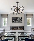 Contemporary 6-Light Hanging Chandelier in Matte Black and Brass Finish with Mid Century Geometric Pendant Design in living room
