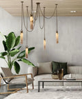 Sleek 12 Light Alabaster Pendant Lamp With Cylinder Shade And Killer Led Glow For Modern Dining Rooms in stylish living room setting.