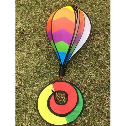 Rainbow Windsock Set Of 3 Hot Air Balloon Wind Spinners on grass, showcasing colorful panels for garden and yard decor.