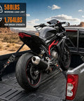 Heavy Duty Self Retracting Tie Down Straps 4 Pack No Drama Auto Retract System With Tangle Free Webbing 1 Inch By 10 Feet securing a motorcycle in a truck bed.