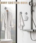 Suction Cup Hooks for Shower and Bathroom No Drill Installation holding robe and towel on glass shower wall