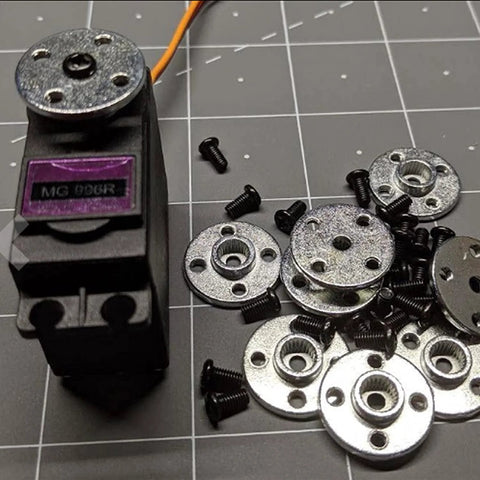 Six aluminum 25T servo horn discs with screws shown beside a black hobby servo