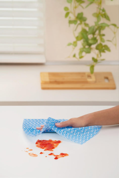 Reusable Kitchen Wipes, 60 Count, Rinse and Reuse Up to 10 Times, cleaning sauce spill on white surface
