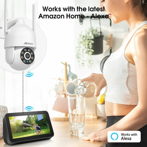 Outdoor 2K WiFi Security Camera With Auto Tracking And Color Night Vision shown with Alexa integration indoors.