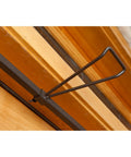 No Sweat Setup Front Door Garland Hanger With Thick Rubber Padded Ends For Year Round Decor Fits Wide Doorjambs No Drill Needed, shown mounted.