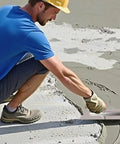 Worker using 11.8x3.8 Inch Concrete Finishing Trowel With Premium Stainless Steel Blade For Smooth Masonry And Drywall Finishes