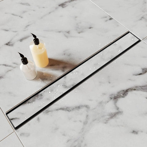 High Capacity Linear Shower Drain Matte Black 24 Inch Large Bathroom Floor Tile Compatible Premium X Shaped Channel System Clears Standing Water Fast with soap bottles