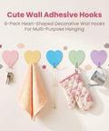 Hella Cute 10 Pack Heart Wall Hooks Super Sturdy Adhesive Mount Easy No Sweat Install Rust Resistant Stainless Steel Heavy Duty Stick On Organizers For Home Decor And Storage, displayed with colorful hooks holding towels and keys.