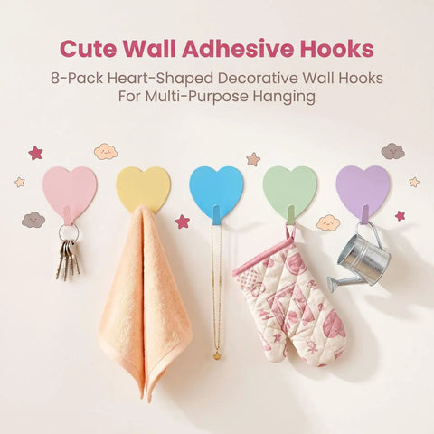 Hella Cute 10 Pack Heart Wall Hooks Super Sturdy Adhesive Mount Easy No Sweat Install Rust Resistant Stainless Steel Heavy Duty Stick On Organizers For Home Decor And Storage, displayed with colorful hooks holding towels and keys.