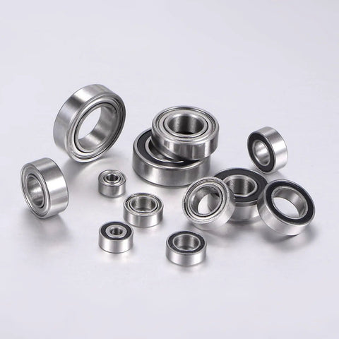 Assorted MR104ZZ Deep Groove Ball Bearing 4x10x4mm Chrome Steel Double Shielded displayed on a white background for small machinery projects.