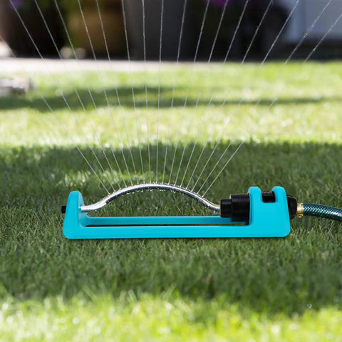 18 Brass Nozzles Oscillating Lawn Sprinkler With Heavy Duty Base Covers Up To 3600 Sq Ft For Yard And Garden, Built In Spray Jet Cleaning Needle, Durable Garden Hose Sprayer on grass