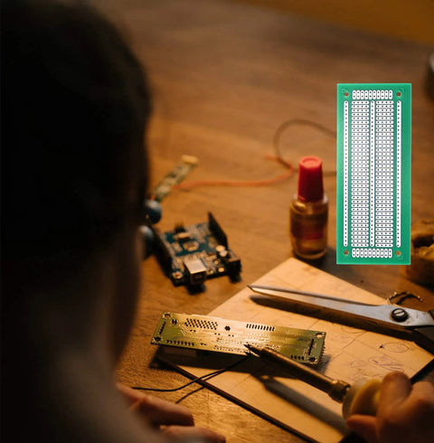 Pack Of 8 47x116mm PCB Strip Breadboards For Prototyping And DIY Electronics Projects Green FR4 Glass Fiber, close-up of one board