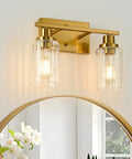 Two Light Brushed Gold Vanity Light With Fluted Glass Shade For Modern Bathroom Over Mirror showcasing gold finish and fluted glass.