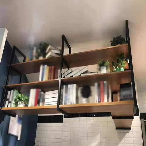 Premium Heavy Duty Floating Shelf Bracket Three Tier Ceiling Mount Design Industrial Metal Shelf Support For Kitchen Office Wall Storage Rack Built Tough As Nails with plants and books on wooden shelves.