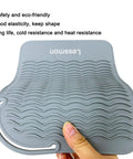 Heavy Duty Heat Resistant Mat For Curling Irons And Hair Styling Tools 11 Inch By 7.5 Inch Silicone Counter Pad with textured grip