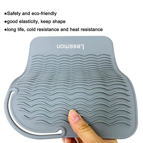 Heavy Duty Heat Resistant Mat For Curling Irons And Hair Styling Tools 11 Inch By 7.5 Inch Silicone Counter Pad with textured grip