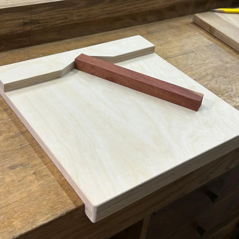 Heavy Duty Desktop Wood Carving Jig With Killer Grip And Precision Stop Made For Newbie Whittlers and weekend woodworkers, showing birch plywood base with raised stop.