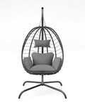Cozy Outdoor Hanging Egg Chair With Stand For Patio And Garden, grey wicker swing chair with UV resistant cushion, front view.