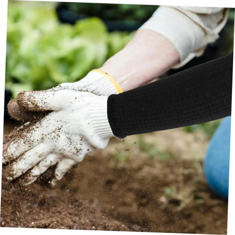 Heavy Duty Cut Resistant Arm Guards And Thorn Proof Work Sleeves Delivering Badass Coverage For Mechanics Welders Gardeners Handling Outdoor Tasks And Weekend Project Grind, worn while digging soil.