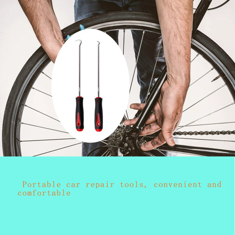 heavy-duty oil seal removal tool set next to bicycle repair