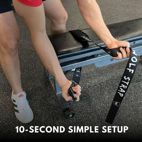 Nordic Curl Strap Heavy Duty Leg Curl Attachment With Easy 10 Second Setup being attached to a gym bench