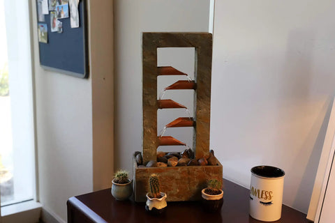 Spillway Rustic Indoor Tabletop Water Fountain with Slate and Copper Finish chill vibe in living room setting, 19x10x6 inches