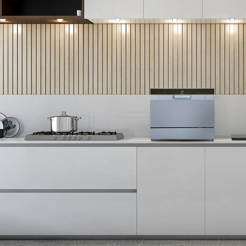 Compact Countertop Dishwasher With Bright Led Controls Delay Start Energy Star Rated Six Place Settings Smooth Operator Automatic Detergent Dispenser No Sweat Setup Universal Faucet Adapter Sleek Silver Finish on modern kitchen counter.