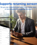 Man using phone with Wireless Home Security Alarm System Kit With 4G LTE And WiFi, app showing alerts and sensor renaming feature.