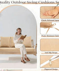 Woman reading on porch swing with light khaki Four Pack Porch Swing Cushions With Pillows For 3 Seater Patio Benches