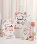 Team Bride Gift Bags With Handles Set Of 20 for Bridesmaids, durable paper bags with floral design for wedding gift wrapping.