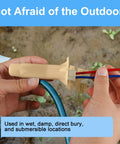 Hands assembling 30 Pack Waterproof Direct Burial Wire Cable Splice Kit 22AWG To 10AWG for landscape and irrigation use.