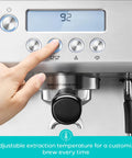 Hand adjusting Ultra Espresso Machine With LCD Display And Powerful Milk Frother For Cafe Quality Lattes And Cappuccinos At Home