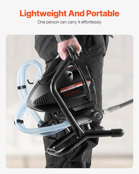 Heavy Duty Electric Airless Paint Sprayer With 650W Motor And 3000 Psi Pressure held by a person, showcasing portability and design.