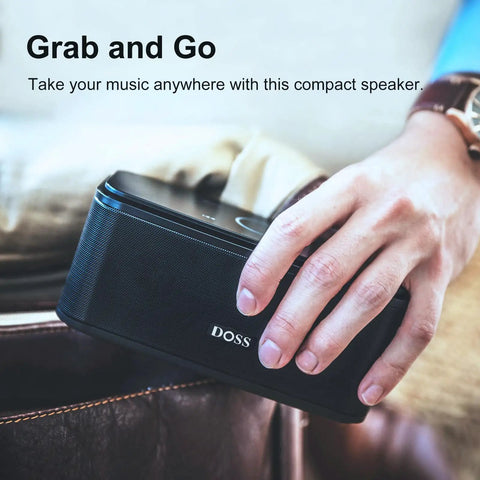 Person holding compact 12W Bluetooth Speaker With Rich Bass And Crystal Clear Sound, IPX5 Waterproof, 20 Hour Playtime, in hand