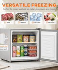1.1 Cu Ft Compact Mini Freezer Solid Upright Build with removable shelf, storing various foods like meat, seafood, and ice cream.