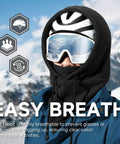 Person wearing Balaclava Ski Face Mask With Windproof Thermal Comfort For Men And Women Convertible Hood Full Head Cover Scarf Neck Gaiter For Cold Weather Black Stay Toasty in snowy mountains.