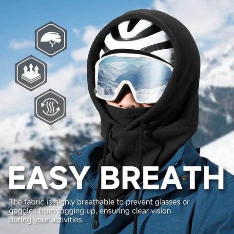 Person wearing Balaclava Ski Face Mask With Windproof Thermal Comfort For Men And Women Convertible Hood Full Head Cover Scarf Neck Gaiter For Cold Weather Black Stay Toasty in snowy mountains.