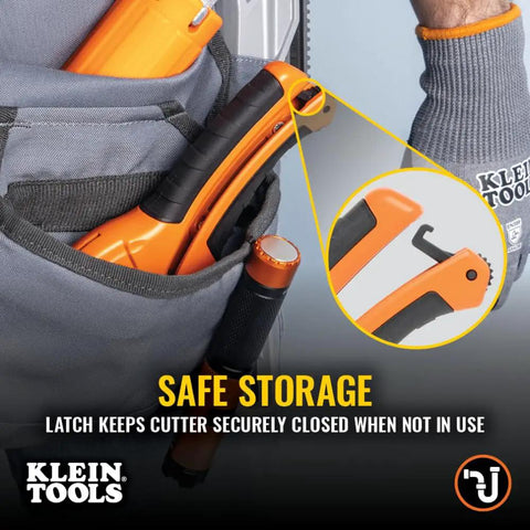 Ratcheting PVC Pipe Cutter For One Handed Use in a pocket showcasing secure latch storage, orange handle visible