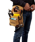 Person wearing Genuine Suede Leather Tool Pouch Bag With 2 Hammer Holders And 10 Pockets For Carpenters Construction Framers And Handymen Fits Up To Two And A Half Inch Tool Belts