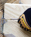 Person using MAX Drive Exterior Decking And Outdoor Wood Screws With Bronze SKT Coating For Exterior Wood 2.5 Inch Number Ten 6 Lobe 25 Drive No Pre Drill 240 Pack Includes One Bit In Jar For Decks Fences And Outdoor Wood V56101 on wooden deck plank