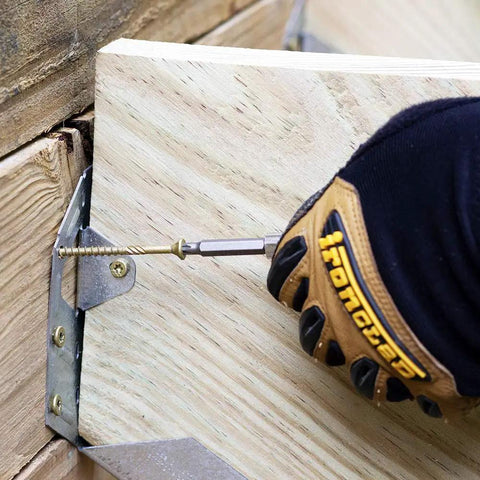 Installing Tough Number 10 By 3 Half Inch Decking Screws Featuring Six Lobe Drive And Galvanized Bronze Finish into wood.