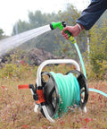 Portable Hose Reel Storage Shelf For One Half Inch Hose Up To 20 Meters in use, watering garden, hose rolled on trolley